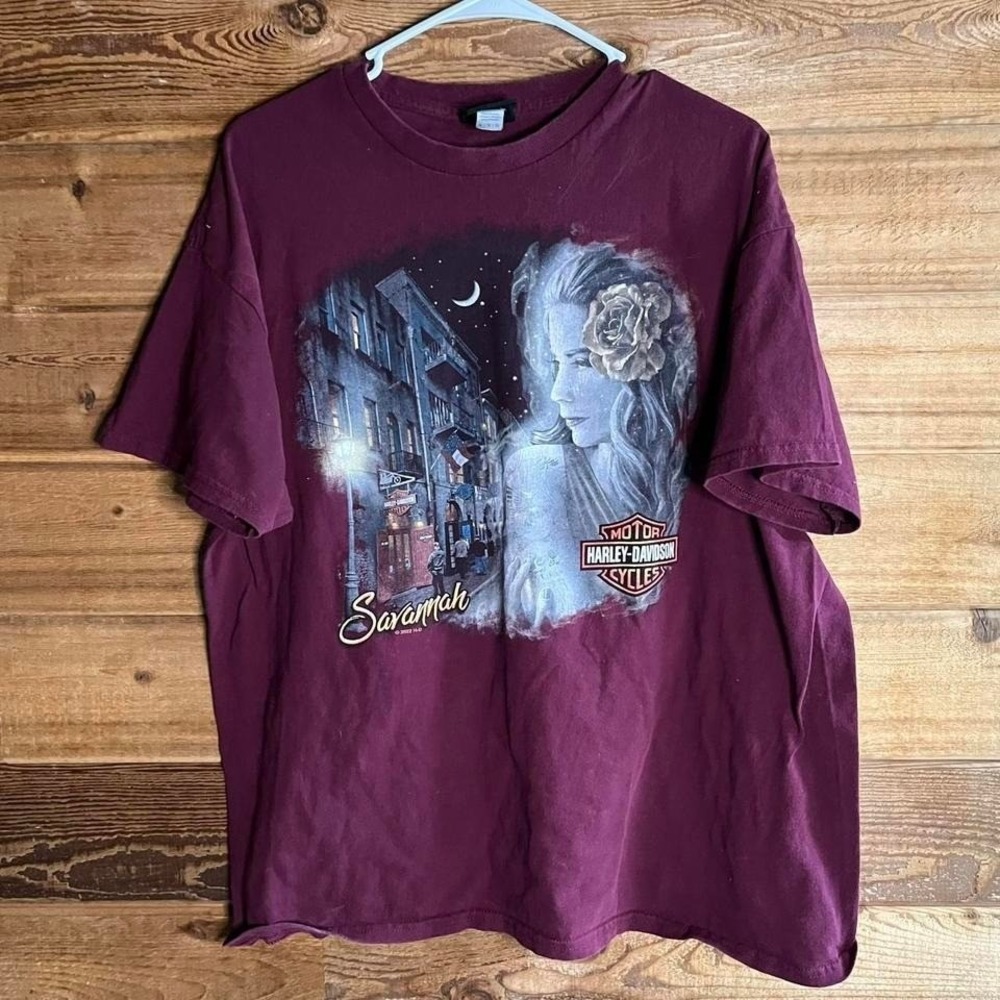 Harley Davidson burgundy t-shirt with graphic design.